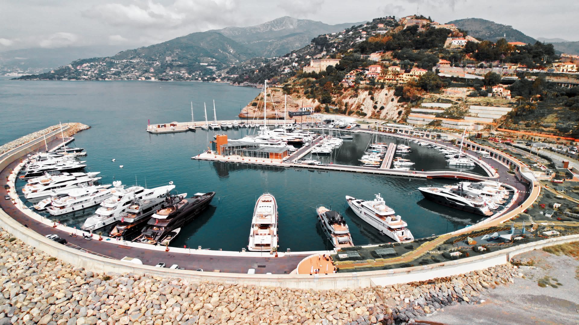 Port of Cala del forte with yachts and a hub for drone delivery